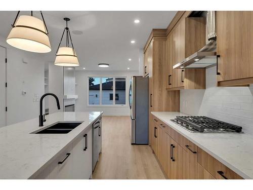 7108 36 Avenue Nw, Calgary, AB - Indoor Photo Showing Kitchen With Double Sink With Upgraded Kitchen