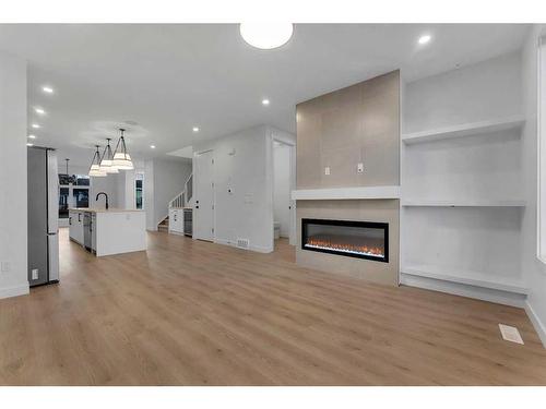 7108 36 Avenue Nw, Calgary, AB - Indoor Photo Showing Other Room With Fireplace