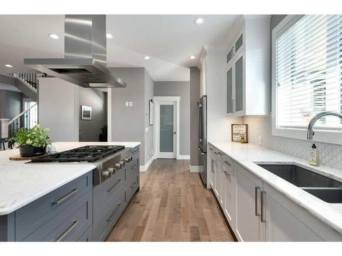 173 Brome Bend, Rural Rocky View County, AB - Indoor Photo Showing Kitchen With Double Sink With Upgraded Kitchen