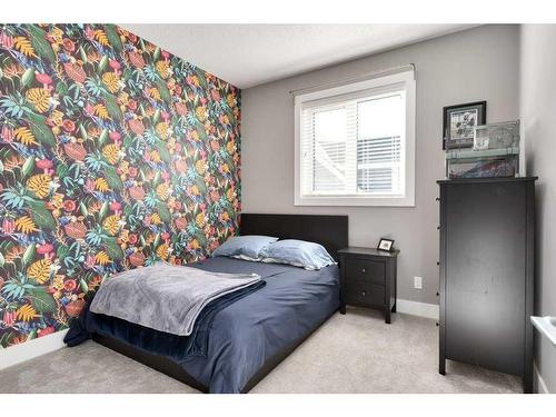 173 Brome Bend, Rural Rocky View County, AB - Indoor Photo Showing Bedroom