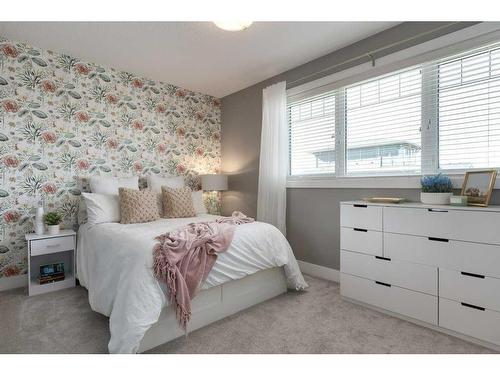 173 Brome Bend, Rural Rocky View County, AB - Indoor Photo Showing Bedroom