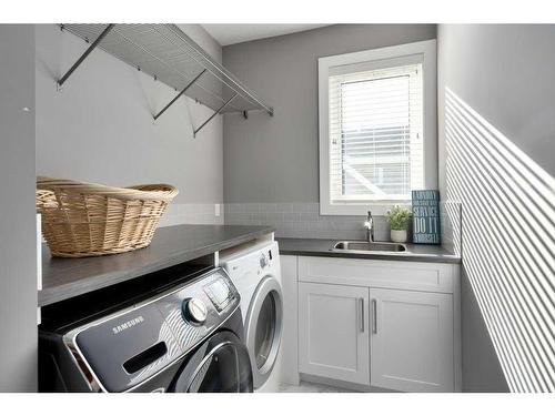 173 Brome Bend, Rural Rocky View County, AB - Indoor Photo Showing Laundry Room