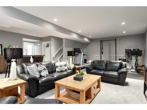 173 Brome Bend, Rural Rocky View County, AB - Indoor Photo Showing Living Room