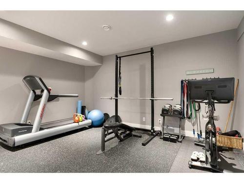 173 Brome Bend, Rural Rocky View County, AB - Indoor Photo Showing Gym Room