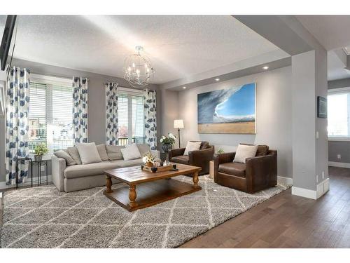 173 Brome Bend, Rural Rocky View County, AB - Indoor Photo Showing Living Room