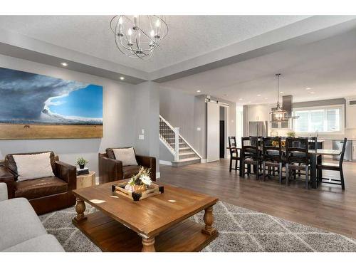 173 Brome Bend, Rural Rocky View County, AB - Indoor Photo Showing Living Room