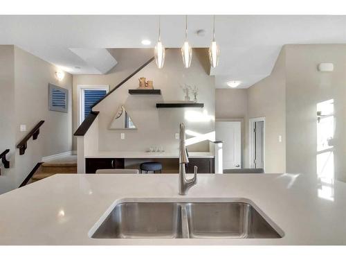 733 River Heights Crescent, Cochrane, AB - Indoor Photo Showing Kitchen With Double Sink