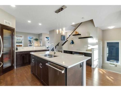 733 River Heights Crescent, Cochrane, AB - Indoor Photo Showing Kitchen With Double Sink