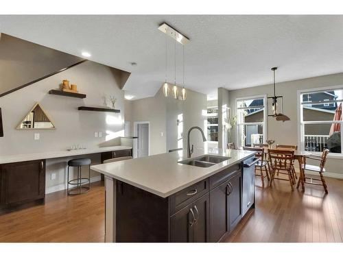 733 River Heights Crescent, Cochrane, AB - Indoor Photo Showing Kitchen With Double Sink