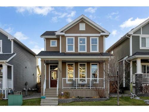 733 River Heights Crescent, Cochrane, AB - Outdoor With Deck Patio Veranda With Facade