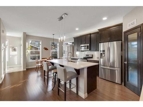 733 River Heights Crescent, Cochrane, AB - Indoor Photo Showing Kitchen With Stainless Steel Kitchen With Upgraded Kitchen