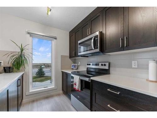 460 Seton Circle Se, Calgary, AB - Indoor Photo Showing Kitchen