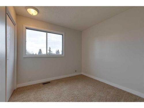 175 Bedwood Bay Ne, Calgary, AB - Indoor Photo Showing Other Room