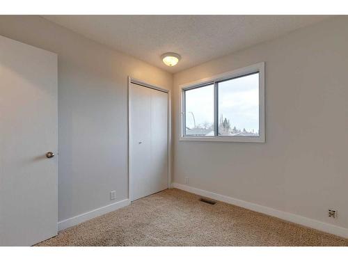 175 Bedwood Bay Ne, Calgary, AB - Indoor Photo Showing Other Room