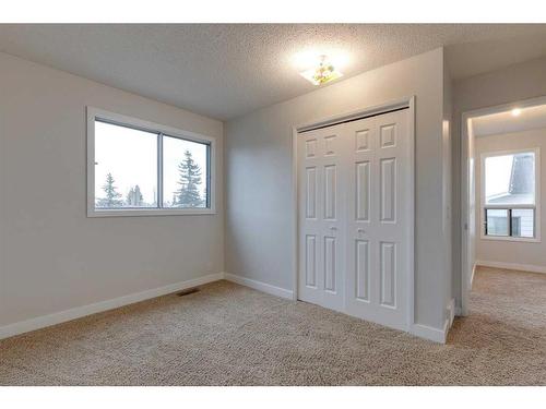 175 Bedwood Bay Ne, Calgary, AB - Indoor Photo Showing Other Room