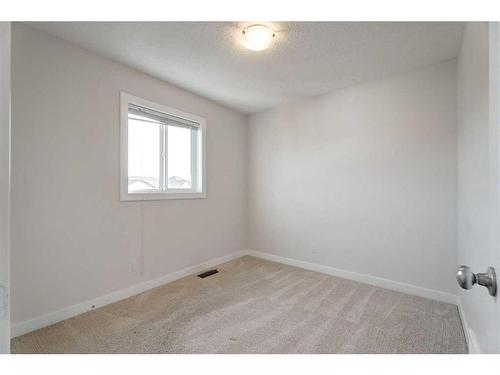 174 Clydesdale Way, Cochrane, AB - Indoor Photo Showing Other Room