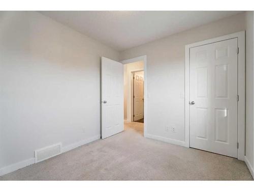 174 Clydesdale Way, Cochrane, AB - Indoor Photo Showing Other Room