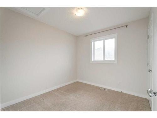 174 Clydesdale Way, Cochrane, AB - Indoor Photo Showing Other Room