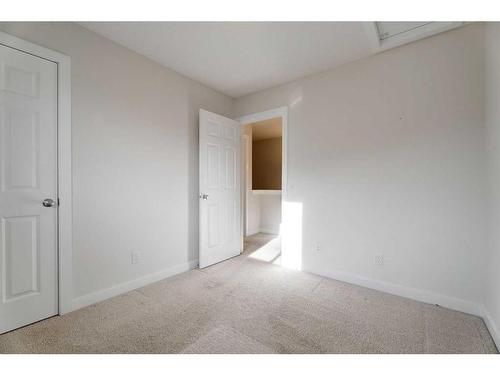 174 Clydesdale Way, Cochrane, AB - Indoor Photo Showing Other Room