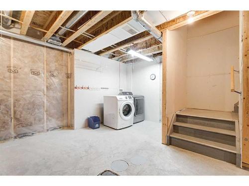 174 Clydesdale Way, Cochrane, AB - Indoor Photo Showing Laundry Room