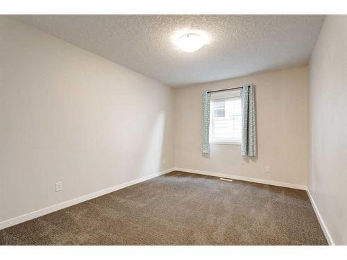 17 Riviera Place, Cochrane, AB - Indoor Photo Showing Other Room