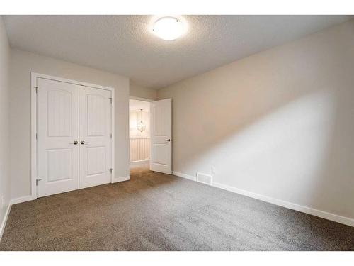 17 Riviera Place, Cochrane, AB - Indoor Photo Showing Other Room