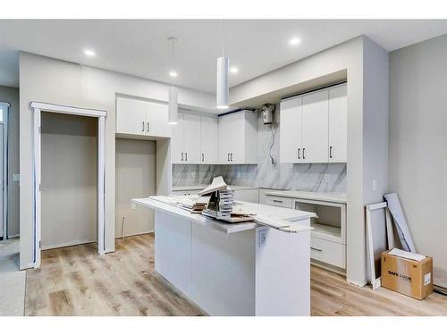 163 Sawgrass Gate Nw, Airdrie, AB - Indoor Photo Showing Kitchen