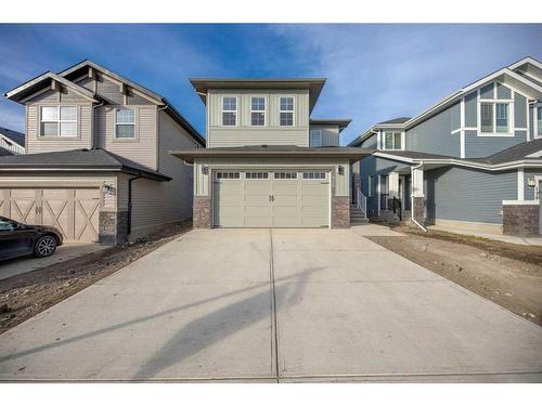 486 Clydesdale Way, Cochrane, AB - Outdoor With Facade