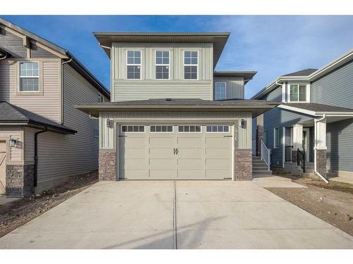 486 Clydesdale Way, Cochrane, AB - Outdoor With Facade