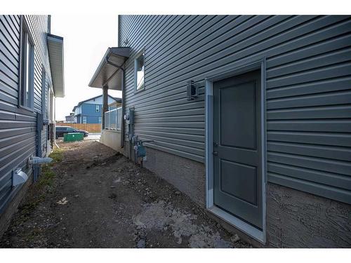 486 Clydesdale Way, Cochrane, AB - Outdoor With Exterior