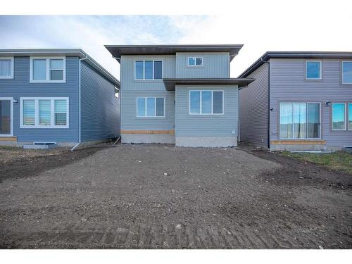 486 Clydesdale Way, Cochrane, AB - Outdoor With Facade