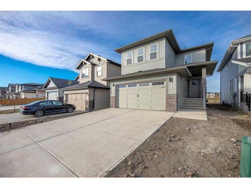 486 Clydesdale Way, Cochrane, AB - Outdoor With Facade