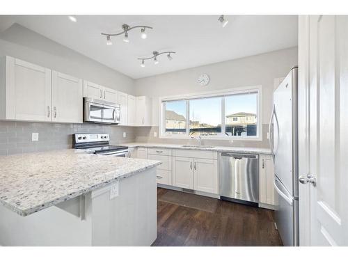 118 Marquis Common Se, Calgary, AB - Indoor Photo Showing Kitchen With Stainless Steel Kitchen With Upgraded Kitchen