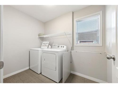 118 Marquis Common Se, Calgary, AB - Indoor Photo Showing Laundry Room