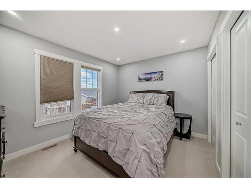 73 Fireside Bend, Cochrane, AB - Indoor Photo Showing Bedroom