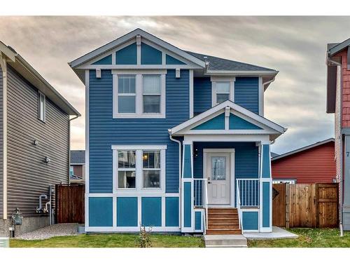 73 Fireside Bend, Cochrane, AB - Outdoor With Facade