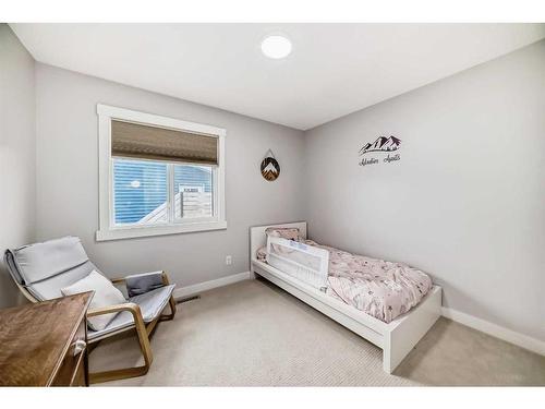 73 Fireside Bend, Cochrane, AB - Indoor Photo Showing Bedroom