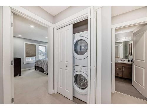 73 Fireside Bend, Cochrane, AB - Indoor Photo Showing Laundry Room