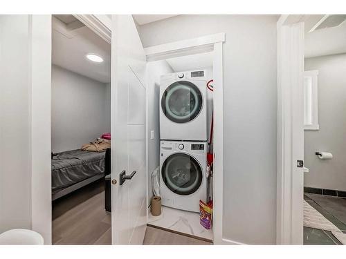 73 Fireside Bend, Cochrane, AB - Indoor Photo Showing Laundry Room