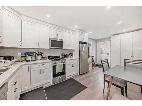 73 Fireside Bend, Cochrane, AB - Indoor Photo Showing Kitchen With Stainless Steel Kitchen