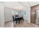 73 Fireside Bend, Cochrane, AB  - Indoor Photo Showing Dining Room 