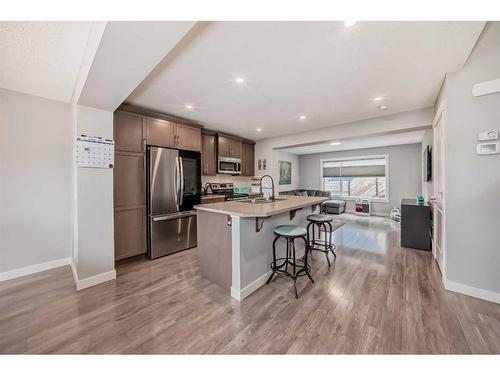 73 Fireside Bend, Cochrane, AB - Indoor Photo Showing Kitchen With Stainless Steel Kitchen