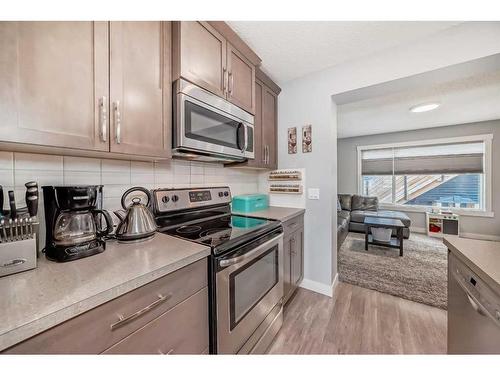 73 Fireside Bend, Cochrane, AB - Indoor Photo Showing Kitchen