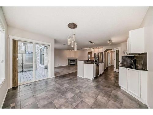 135 Cougarstone Square Sw, Calgary, AB - Indoor Photo Showing Kitchen