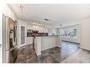 135 Cougarstone Square Sw, Calgary, AB  - Indoor Photo Showing Kitchen 