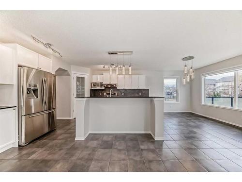 135 Cougarstone Square Sw, Calgary, AB - Indoor Photo Showing Kitchen