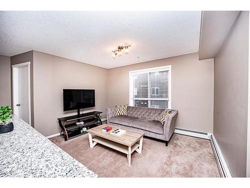 2420-4641 128 Avenue Ne, Calgary, AB - Indoor Photo Showing Living Room