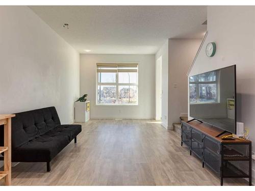 92 Carringvue Way Nw, Calgary, AB - Indoor Photo Showing Living Room