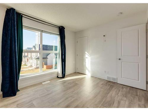 92 Carringvue Way Nw, Calgary, AB - Indoor Photo Showing Other Room