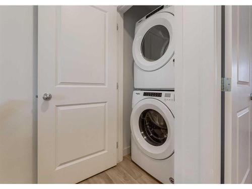 92 Carringvue Way Nw, Calgary, AB - Indoor Photo Showing Laundry Room